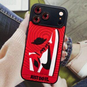 Custom Nike-themed phone case with red, black, and white accents for a sporty look.